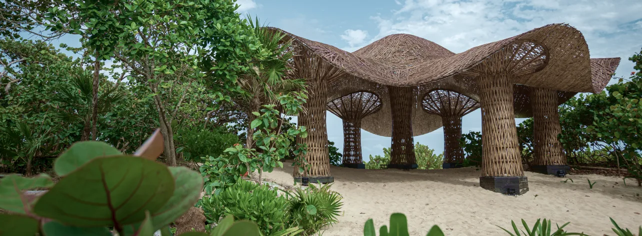Woven beach pavilion in the jungle